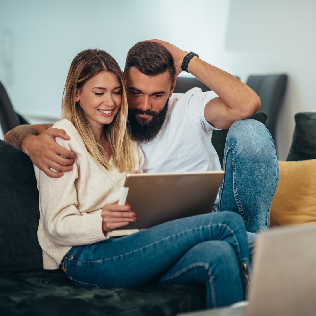 Couple using digital tablet for video call